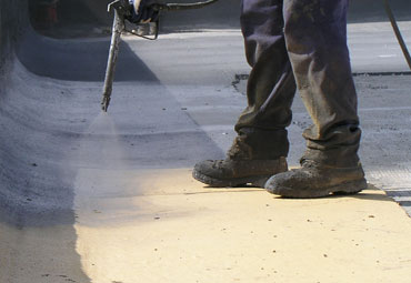 Coating systems over Providence spray foam roof systems